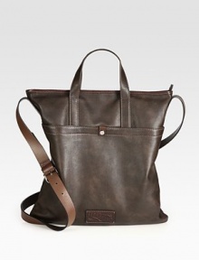 Rich Italian calfskin, expertly crafted into a spacious tote with pockets and compartments for all your work and weekend essentials.Double top handlesAdjustable shoulder strapZip top closureOuter snap pocketsInner zip pocket and key fob15W X 15H X 2½DMade in Italy