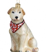 Puppy love at first sight. Just begging for a home, this yellow lab ornament is irresistible to animal lovers in hand-painted glass by Joy to the World.