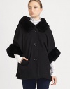 EXCLUSIVELY AT SAKS.COM A luxurious wool and cashmere style trimmed in dyed rex rabbit fur. Oversized dyed rex rabbit shirt collarThree-quarter length sleeves with dyed rex rabbit cuffsButton closureSlash pocketsFully lined90% wool/10% cashmereSpecialist dry cleanImported Fur origin: China 