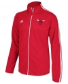 Take your best shot and support your favorite NBA basketball team with this Chicago Bulls jacket from adidas.