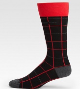 A captivating grid pattern lends modern flair to this simple dress sock shaped in a generous cotton blend with a hint of stretch for maximum comfort and support.Mid-calf heightCotton/polyamide/modal/elastaneMachine washImported