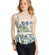 A lush landscape print adds femme appeal to a top washed in crochet knit trims and crisp pleats! From Jessica Simpson.