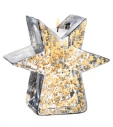 As good as gold, the Glimmer votive candle holder twinkles with holiday fun but dazzles all year long in heavy, shimmering crystal. By Anna Ehrner for Kosta Boda.