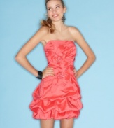 A gathered bubble skirt and rhinestone-studded rosettes are winning details on this flirty party dress from Sequin Hearts!