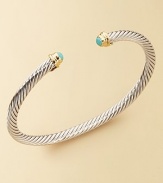 From The Cable Kids Collection. A charming sterling silver cable with turquoise end caps set in 18k gold. Turquoise Sterling silver and 18k yellow gold Cable, 4mm Diameter, about 2 Made in USA