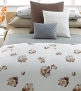 Cool and warm tones commingle in this Teaflower comforter from Calvin Klein, featuring an abstract watercolor floral design on a pale aqua ground.