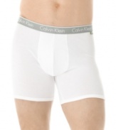 Calvin Klein fuses comfort and style with these stretch cotton boxer briefs, designed in a sporty, modern fit that goes where you go.