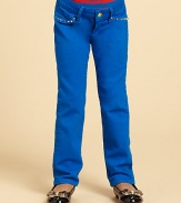 Colored denim with decorative rivets and just a hint of stretch.Front buttonWaistband with belt loopsZip flyFive-pocket styleRivet details86% cotton/11% polyester/3% spandexMachine washMade in USA