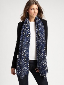 A lightweight cashmere style with an abstract print. Cashmere About 75 X 36 Dry clean Imported 