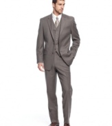 A must-have for every man, this tan herringbone suit from Michael Kors is ready for the office and beyond.