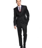Smooth and expertly tailored, this slim-fit vested suit by Tommy Hilfiger completes your dresswear collection.