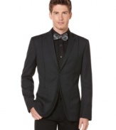 This Perry Ellis blazer offers a sleek slim fit and classic solid design perfect for the office or after party.