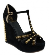 Your one-way ticket to fabulous. Vince Camuto decked out the already amazing Simonas wedge sandals with plenty of studs for an edgy, rock star vibe.
