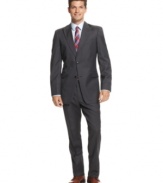 A cool classic. This suit from Tommy Hilfiger has a crisp charcoal stripe and a modern slim fit that takes your dress-up look to the next level.