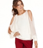 This ethereal top from Jessica Simpson will have you channeling your inner goddess! Shoulder-revealing cutouts and draped chiffon fabric add softness to the look.