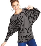 Material Girl contrasts a tiger-print at the front with a back of bold stripes on this dolman sleeve sweater that reflects your love of graphic style!