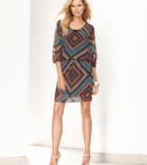 Featuring split sleeves and the liveliest print, this petite dress from INC adds spirit to your day or night look.