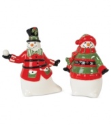 Play up the winter cheer around your table with Fitz and Floyd's snowman salt and pepper shakers. Festively dressed and with a snowball in hand, this whimsical set brightens any holiday scene.