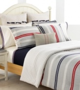 Show your stripes! Featuring a yarn-dyed herringbone and twill weave in stripes of navy, red and ivory, the Tommy Hilfiger Newport Bay duvet cover set renews your bed in classic American style. Reverses to navy pinstripe print. Shams feature side button closure.