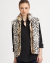 A leopard printed, dyed rabbit style in an easy to layer vest design. Stand collarSleevelessOpen frontAbout 24 from shoulder to hemFully linedDyed rabbitSpecialist dry cleanImported Fur origin: Spain 