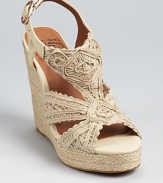 A classic espadrille from Lucky Brand, crafted in macrame with luxe leather details.