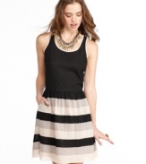Sporty style meets ladylike cool on this dress from American Rag that pairs a racerback top with the femininity of a striped skirt!
