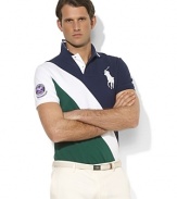 Designed exclusively for Ralph Lauren's collection celebrating the Wimbledon Championships, a classic short-sleeved polo shirt is tailored for a trim, athletic fit from breathable cotton mesh in a preppy color-blocked design.