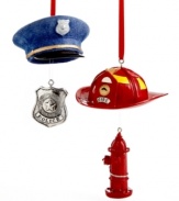 Tip your hat. A hydrant dangles from a fireman's helmet and a badge pairs with a police hat in ornaments that celebrate everyday heroes.