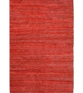 Olé! Spice up your decor with the gorgeously festive style of the Matador rug from St. Croix. Durable leather strips in vibrant pomegranate hues are meticulously hand woven with fine cotton strands, resulting in a beautiful, rustic texture and natural braided pattern that accents even the most eclectic decor.