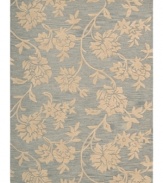 Uplifting style. Nourison's Skyland rug features lush, dreamy florals rendered in soft blue and beige shades, bringing a heavenly feel to any space. The plush wool rug is enhanced with meticulous hand carving for beautiful detail and texture.