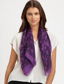 This subtle lace print features stylized, signature emblems. SilkAbout 43¼ X 43¼Dry cleanMade in Italy