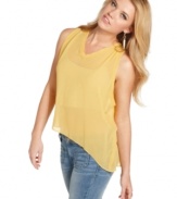 Sheer and asymmetrical, this top from GUESS? strikes a chic cord by combining two of the season's most trend-right details!