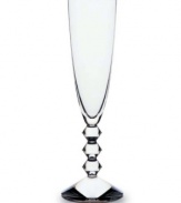 The Vega Stemware Collection will make a unique and striking addition to your finely set table. Each piece features a neck lined with thick connecting diamond-shaped glass studs leading fron the commanding sturdy base to the simple bulb, lending a look that has the timeless effect and appeal of glittering diamonds.