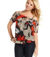 Rock chic, senorita style by day in this top from GUESS?: a medley of bold print, blouson fit and shoulder-baring design!