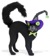 Boo, hiss! With her back arched and tail poofed, this black cat is scared silly, cast under a witch's evil spell. A Halloween figurine with the distinct style of Annalee.