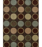 Design that's spot on. This marvelously modern area rug bursts forth from your floor with row upon row of textured circles, presented in appealing colors on a deep chocolate ground, and hand-carved to add that extra, eye-catching dimension.