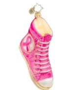 Take steps to conquer and raise awareness about breast cancer with this Christopher Radko charity ornament. Hand painted with a pink ribbon, it celebrates moms, daughters, sisters and other brave women who beat or are now battling the disease. (Clearance)