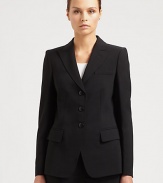A classic three-button silhouette in a featherweight wool fabric. Notched lapelsFlap pocketsFully linedWoolDry cleanMade in ItalyModel shown is 5'10 (177cm) wearing US size 2. 