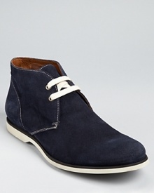 Crafted in fine Italian leather, this chukka cuts a lean profile. John Varvatos' touch is evident in details like subtle topstitching and weather and a sneaker-inspired contrast rubber sole. Crafted in fine Italian leather, this chukka cuts a lean profile. John Varvatos' touch is evident in details like subtle topstitching and weather and a sneaker-inspired contrast rubber sole.