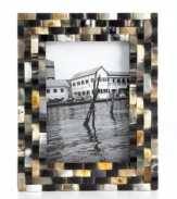 Tiled in lustrous black and tan buffalo horn, this Purva picture frame brings an exotic sensibility to modern decor and favorite photos.