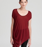 Draping lends simple elegance to this Helmut Lang tee with trend-right asymmetrical hem.