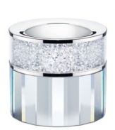With 1,600 chatons, a multi-faceted base and gleaming silvertone metal, this precious Swarovski Crystalline candle holder transforms a single flame into a truly spectacular light show.