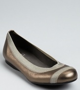 In shimmering metallic leather, these flexible ballet flats offer easily-stowable comfort and style.