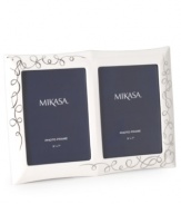 Show your romantic side. Loopy platinum hearts in white porcelain make Mikasa's Love Story double invitation frame a beautiful showcase for your favorite wedding photo and invitation.
