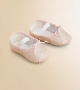 A stylish, shiny ballet flat for your tiny dancer with an elastic strap for a snug fit.Elastic strap with adjustable tiePatent leather upperLeather liningLeather solePadded insoleImported