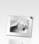 A modern and sophisticated frame stylishly blends the strong, sharp lines of stainless steel with a myriad of tiny faceted clear crystals. Accommodates a 4 X 6 photograph Overall: 5½ X 7 Imported 