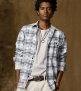 Channel urban-meets-outdoor style in an ultra-comfy plaid flannel shirt for a look that's cool and effortless.