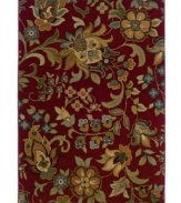 An assemblage of swirling blossoms against a rich sangria-red ground assures a captivating visual addition to your floor. Pairing a hard-twist nylon construction with a special dyeing technique, this transitional piece is designed to recreate the look and feel of the finest antique rugs.