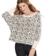 Feel as fierce as a leopard in XOXO's angora sweater featuring long dolman sleeves and a fashion-forward oversized fit!