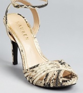 A strappy, snakeskin embossed silhouette from Lauren by Ralph Lauren lends itself to daytime and after-hours alike.